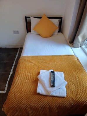 Kamar Single Basic | Wi-Fi gratis dan seprai linen