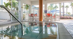 Indoor pool, a heated pool - Close to SeaWorld Spacious Two Bedroom w/ pools, hot tubs, bbq pits and family adventures (Orlando)