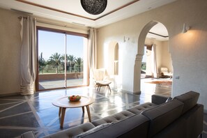 Villa, Multiple Bedrooms | Living area | Flat-screen TV, stereo