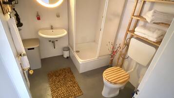 Hair dryer, towels, soap, shampoo