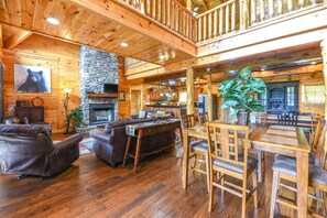 40-inch flat-screen TV with cable channels, TV, fireplace - SmokyStays 6 Bedroom Cabin (Pigeon Forge)
