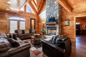 40-inch flat-screen TV with cable channels, TV, fireplace - SmokyStays 6 Bedroom Cabin (Pigeon Forge)