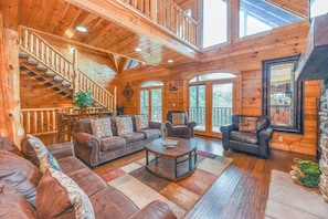 40-inch flat-screen TV with cable channels, TV, fireplace - SmokyStays 6 Bedroom Cabin (Pigeon Forge)