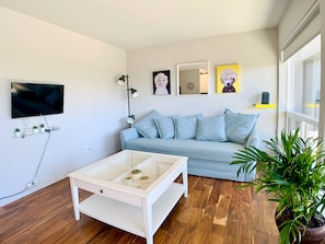 Comfort Apartment | Living area | 32-inch LED TV with digital channels, TV, Netflix