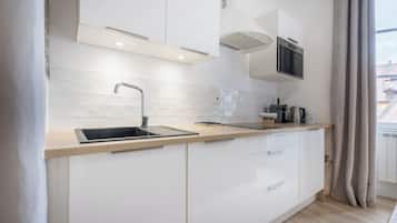 Réfrigérateur, micro-ondes, lave-vaisselle, cafetiÚre/bouilloire