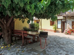 Plant, Building, Window, Flowerpot, Road Surface, Architecture, Tree, Outdoor Furniture, House, Outdoor Bench