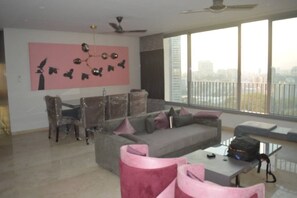 Living area - Premium Pool View in Esquire - Oberoi Garden City (malad east)