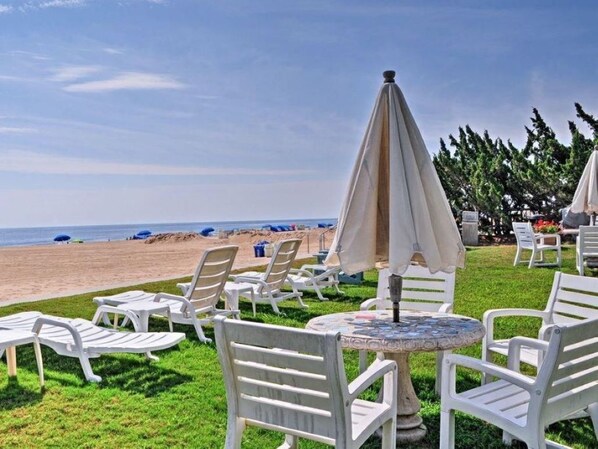 On the beach, sun loungers, beach towels