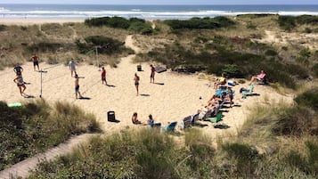 On the beach, sun-loungers, beach towels
