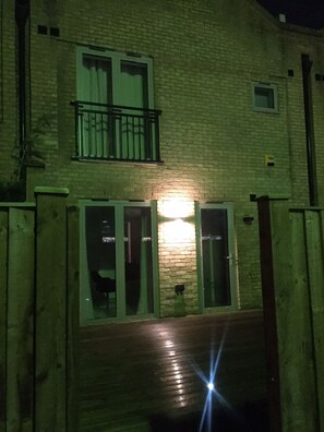 Front of property - evening/night - Water View House (London)