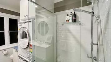 Shower, hair dryer, towels, soap