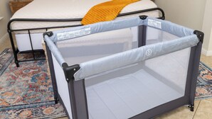 A bed with a metal frame, a mattress, and a headboard. - Fun Downtown Home Near Riverwalk (San Antonio)