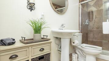 Shower, hair dryer, towels, soap