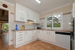 Coffee/tea maker, fridge, microwave, oven