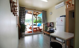 Beige Room | Living area | Flat-screen TV