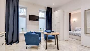 Premium-Apartment | Wohnzimmer | Flachbildfernseher