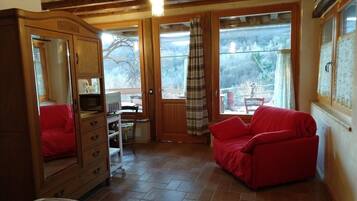 Monolocale, angolo cottura (Suite Olivo) | Soggiorno