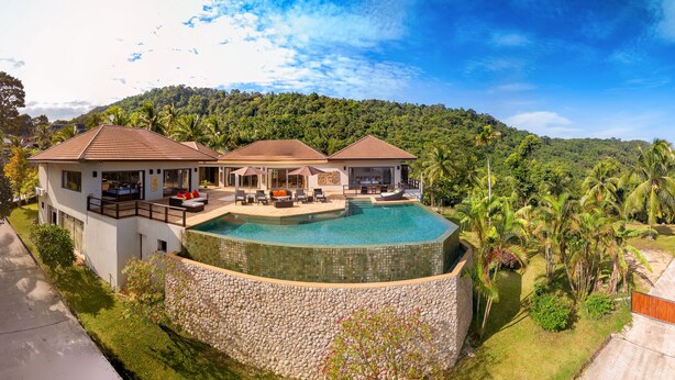 A resort with a swimming pool, multiple villas, and lush greenery. - 2 Bedroom Sea View Villa Bubbles (Koh Samui)