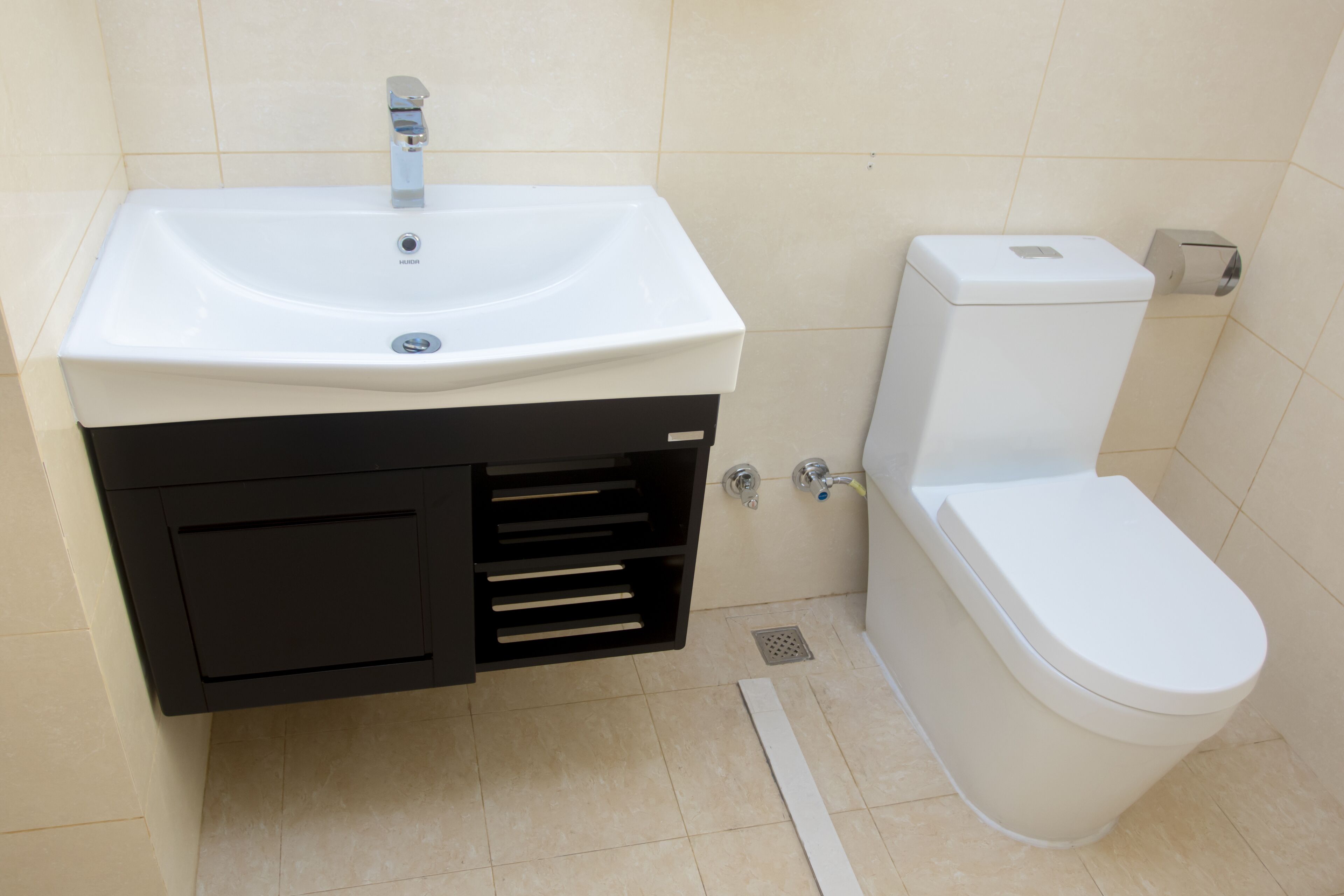 rainfall showerhead, hair dryer, slippers, towels