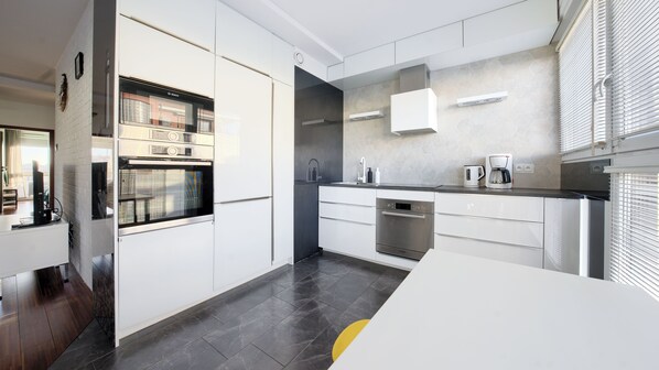 Apartment (23) | Private kitchen | Fridge, stovetop, electric kettle, cookware/dishes/utensils