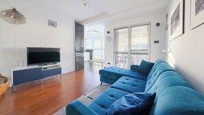 Apartment (23) | Living area | 30-inch flat-screen TV with cable channels, TV