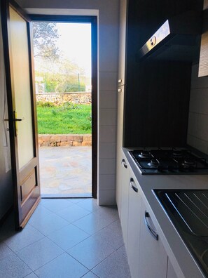 Apartment, 2 Bedrooms | Private kitchen | Full-sized fridge, oven, stovetop, cookware/dishes/utensils - Fantastico San Teodoro Fraili LUC01 (San Teodoro)