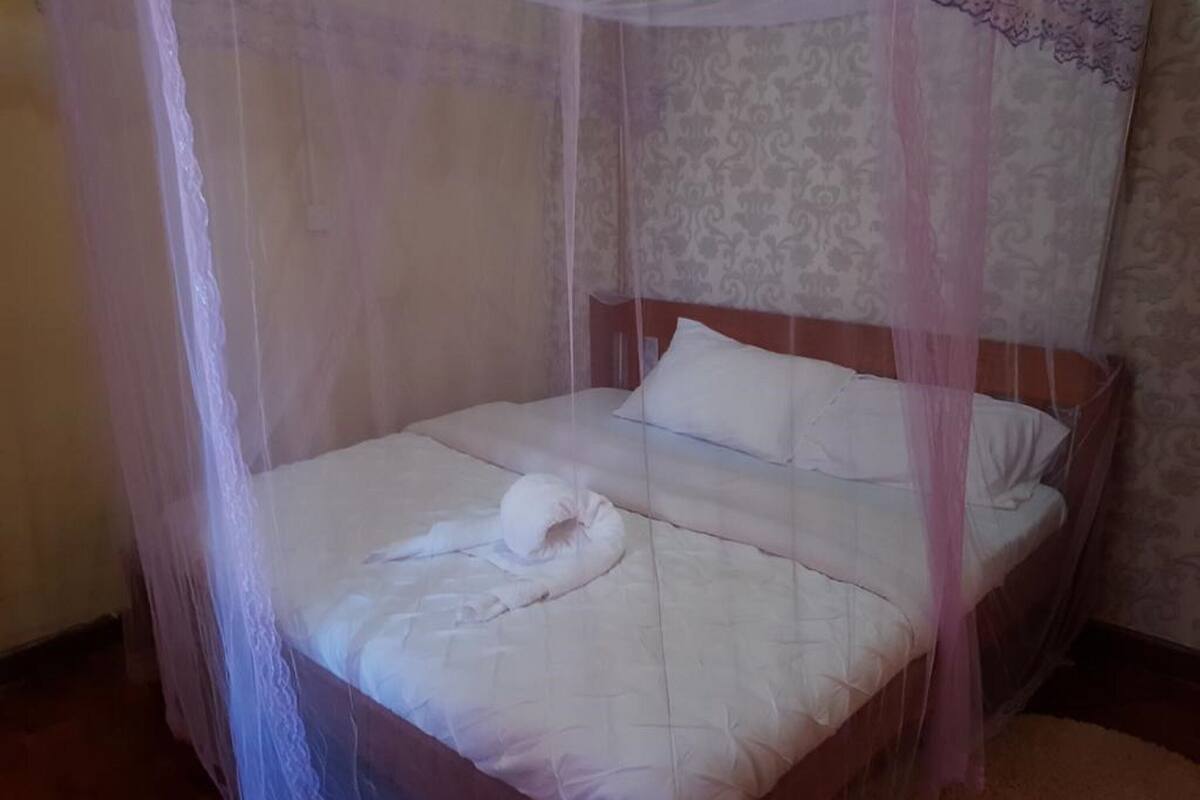 Habitación individual | Escritorio, cortinas opacas, wifi gratis y ropa de cama
