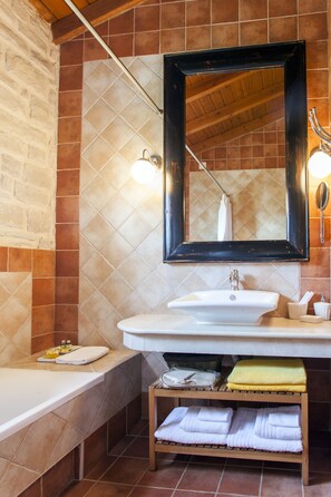 Bathtub, hair dryer, towels, soap