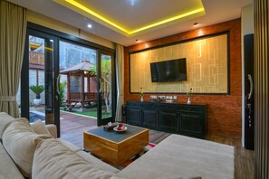 Vila Superior, 2 kamar tidur, kolam renang pribadi | Ruang keluarga | Smart TV