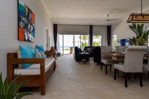 Luxury Villa, 4 Bedrooms, Private Pool, Beach View | Living area | Smart TV - Villa Serenity (Buleleng)