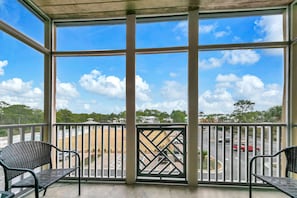 Enjoy the expansive view from this balcony with a clear view of the surrounding area.