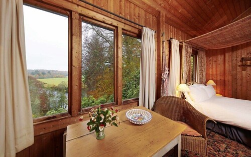Unique Norwegian cabin perched above the River Findhorn with a stunning view