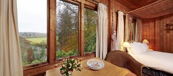 Unique Norwegian cabin perched above the River Findhorn with a stunning view