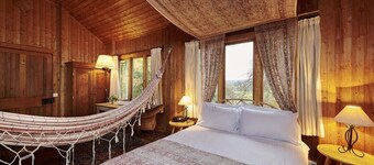 Unique Norwegian cabin perched above the River Findhorn with a stunning view