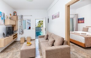 Deluxe Suite, 2 Bedrooms, Private Pool, Pool View | Living area | Flat-screen TV