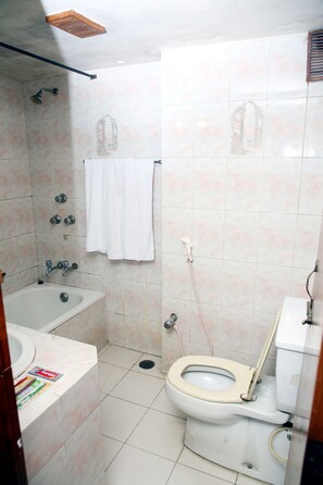 Designer toiletries, slippers, soap, shampoo