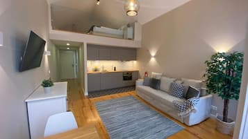 Loft | Private kitchen | Full-size fridge, microwave, stovetop, electric kettle