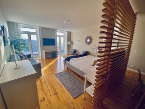 Penthouse | Living area | Flat-screen TV