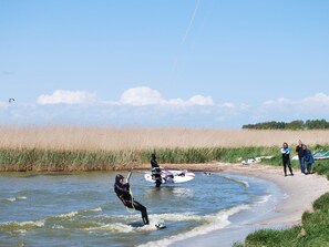 A person windsurfing on a river. - Bungalow in Alt Bukow Near the Beach (Alt Bukow)