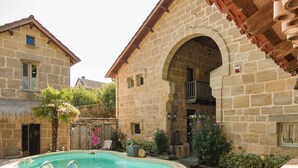Outdoor pool, a heated pool - Luxurious Restored Building With Heated Swimming Pool, Terraces and Jacuzzi (Lacapelle-Marival)
