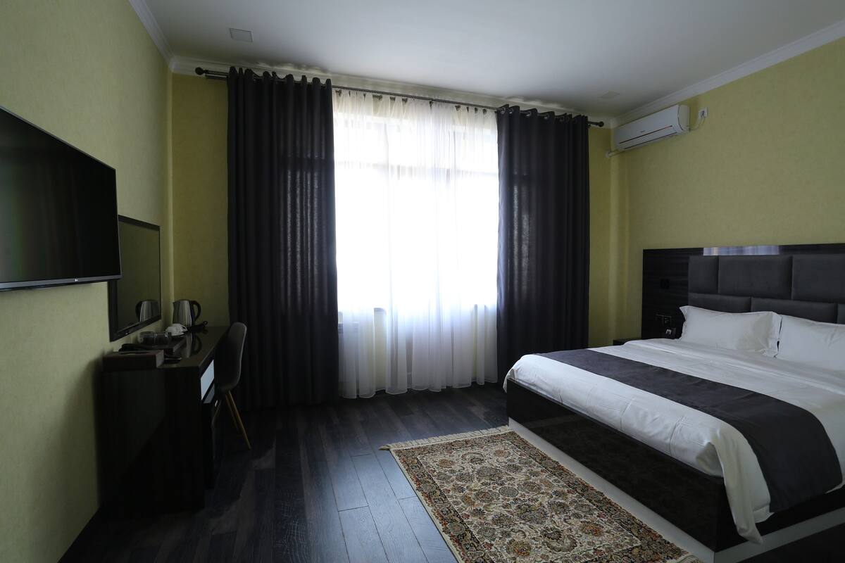 Deluxe Double Room | Premium bedding, in-room safe, desk, laptop workspace