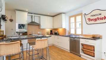 Villa | Private kitchen | High chair, cookware/dishes/utensils