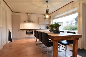 House | Private kitchen | Fridge, high chair - Holiday Home in Callantsoog Near Beach (Callantsoog)