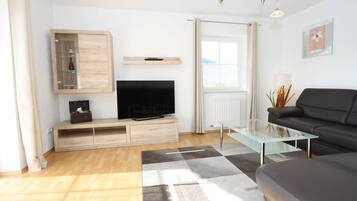 Ferienhaus | Wohnbereich | Fernseher