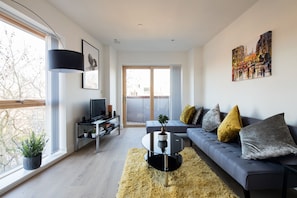 Two Bedroom Apartment | Living room | Flat-screen TV - Stunning flat in the heart of Shoreditch (London)