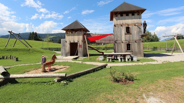 A rustic wooden building with a small entrance and a larger tower-like structure. - Farmhouse in Hopfgarten Near Ski Bus (Hopfgarten im Brixental)