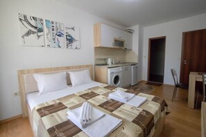 2 habitaciones, tabla de planchar con plancha y wifi gratis 