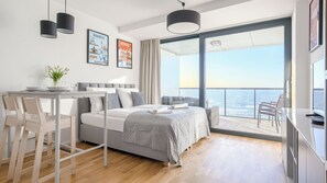 Departamento, vista al mar (508) | Área de sala de estar | Televisión de pantalla plana 