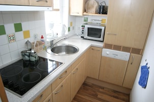 Casa | Cocina privada | Placa de cocina y hervidor eléctrico