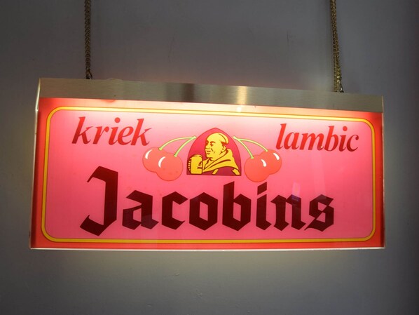A sign with the name 'Jacobins' and the words 'kriek' and 'lambic' indicating the type of beer served. - Holiday Home in Rendeux With Terrace (Rendeux)